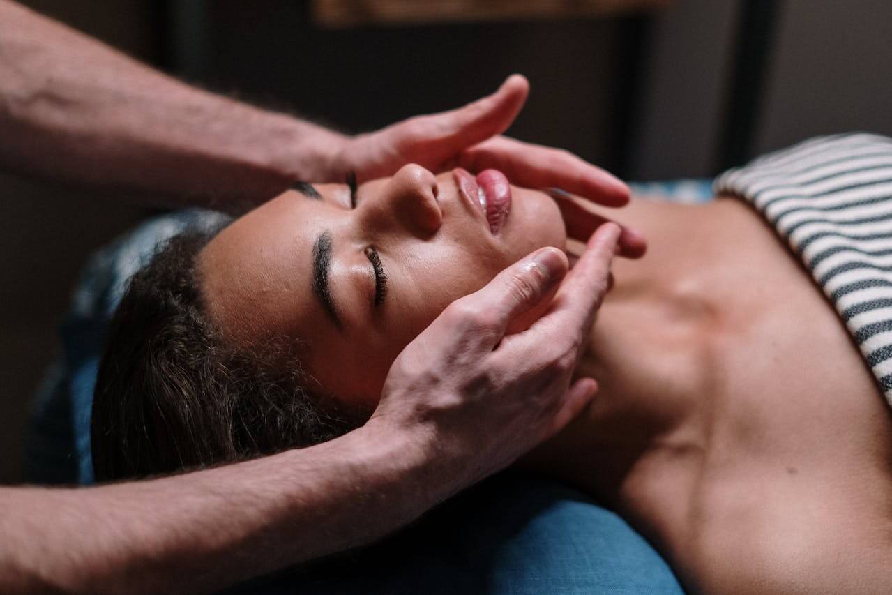 A woman receiving spa treatment at Rénove Med Spa in Houston