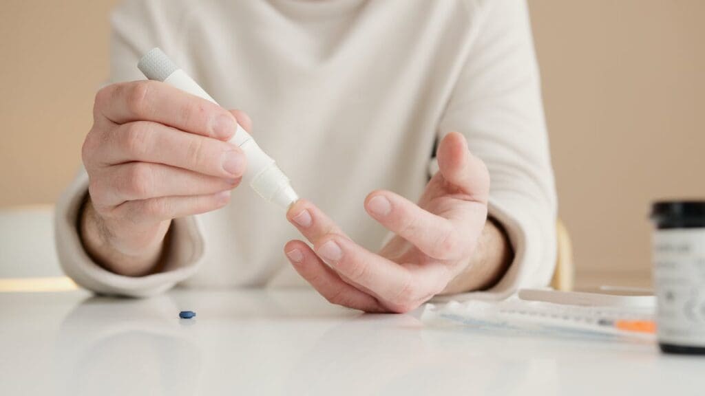 Diabetic person checking blood sugar