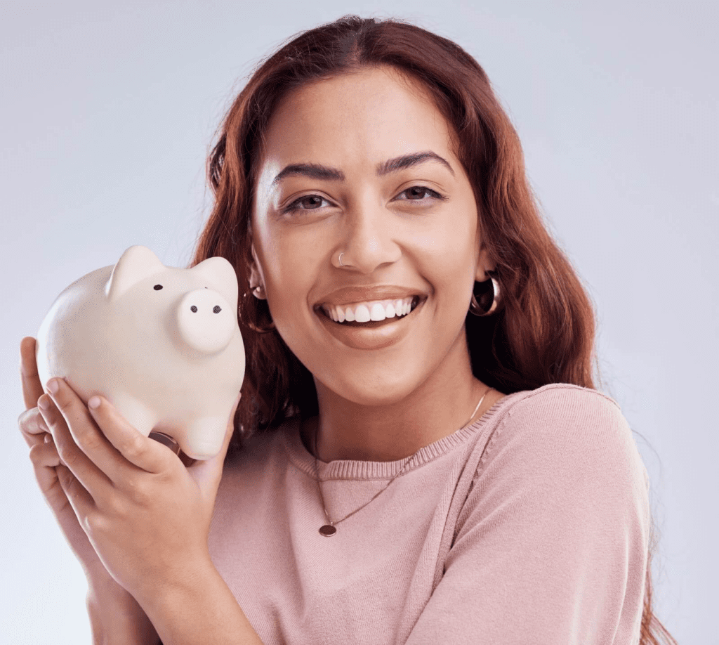 Girl holding piggy bank